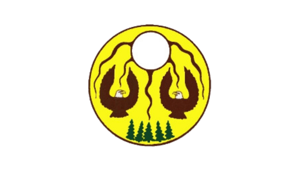 The Grant Getters Emblem with two facing eagles under a sun, with roots extending from the sun to each eagle. Four pine trees are depicted at the bottom, set on a yellow circular background. This emblem symbolizes "The Grant Getters," embodying their strength and unity in grant writing. Grant Writing